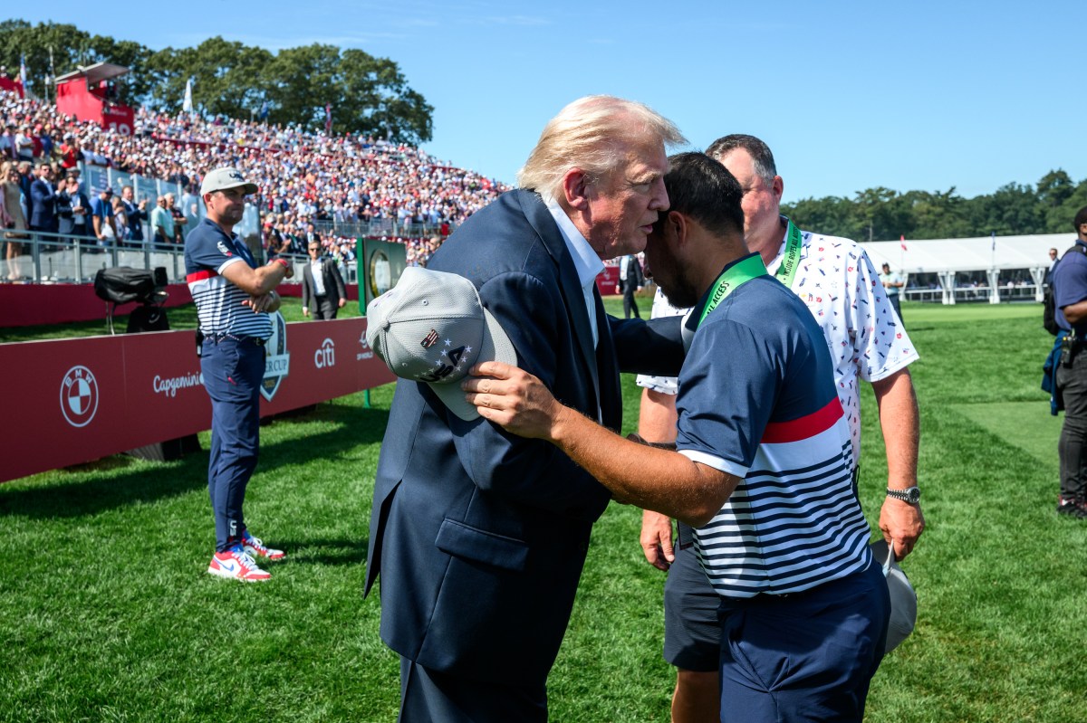 President Donald Trump greets Team U.S. players Bryson DeChambeau and Ben Griffin and waves to the crowds gathered at the first hole of the Ryder Cup Tournament at Bethpage Black Course, Friday, September 26, 2025, in Farmingdale, New York. (Official White House Photo by Joyce N. Boghosian)