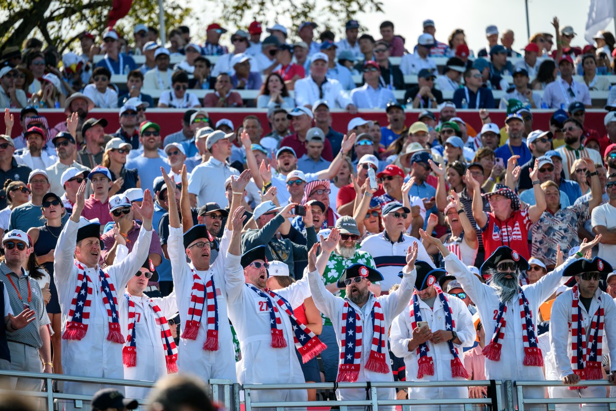 President Donald Trump looks on as Team U.S. players Bryson DeChambeau and Ben Griffin drive the first hole of the Ryder Cup Tournament at Bethpage Black Course, Friday, September 26, 2025, in Farmingdale, New York. (Official White House Photo by Joyce N. Boghosian)