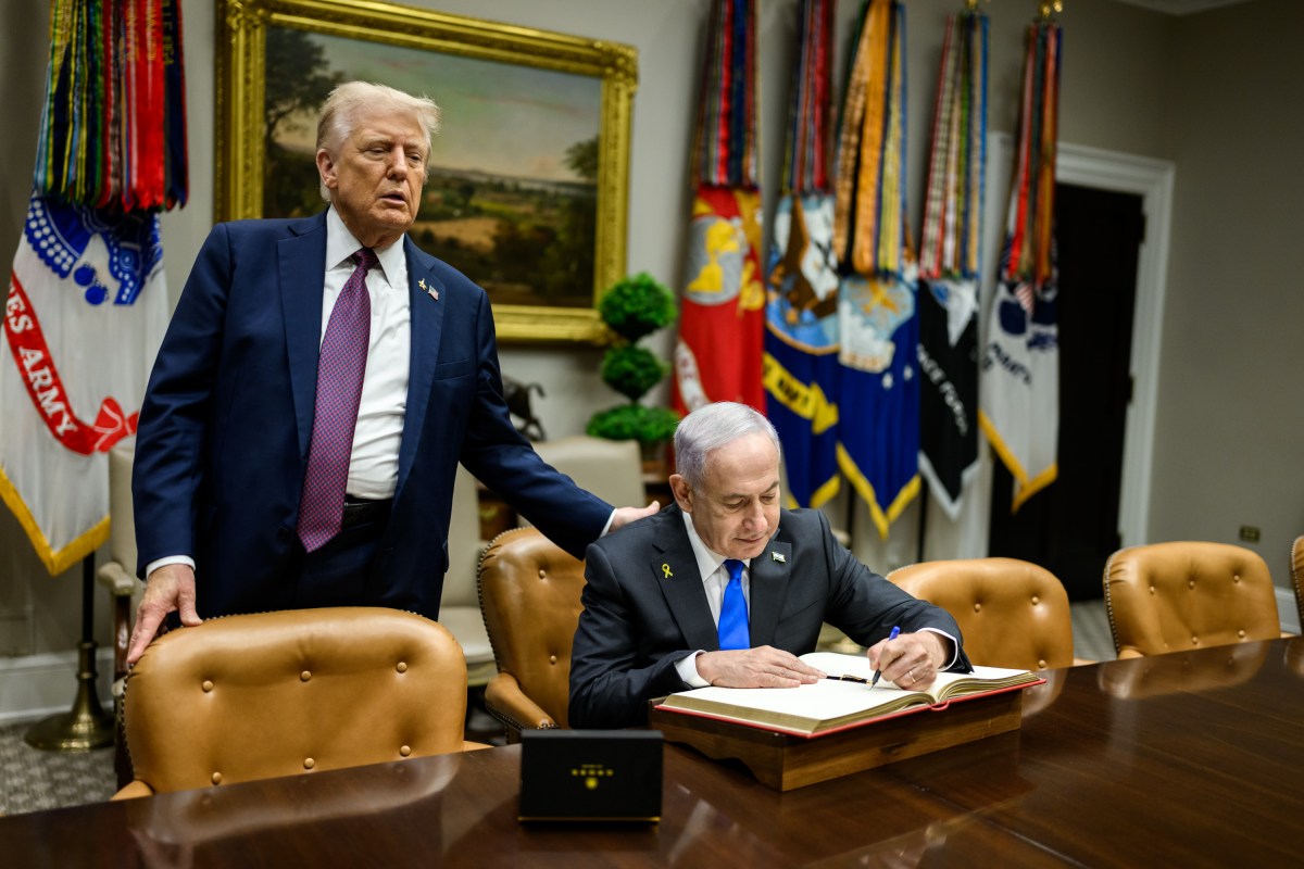 Israeli Prime Minister Benjamin Netanyahu signs the guest book in the Roosevelt Room of the White House, Monday, September 29, 2025, before a bilateral meeting with President Donald Trump. (Official White House Photo by Daniel Torok)