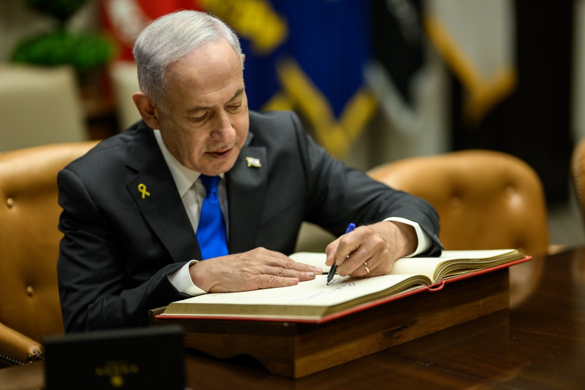 Israeli Prime Minister Benjamin Netanyahu signs the guest book in the Roosevelt Room of the White House, Monday, September 29, 2025, before a bilateral meeting with President Donald Trump. (Official White House Photo by Daniel Torok)
