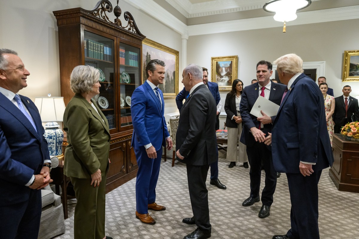 Israeli Prime Minister Benjamin Netanyahu speaks with Secretary of War Pete Hegseth while greeting the U.S. delegation in the West Wing Lobby of the White House, Monday, September 29, 2025, before a bilateral meeting with President Donald Trump. (Official White House Photo by Joyce N. Boghosian)