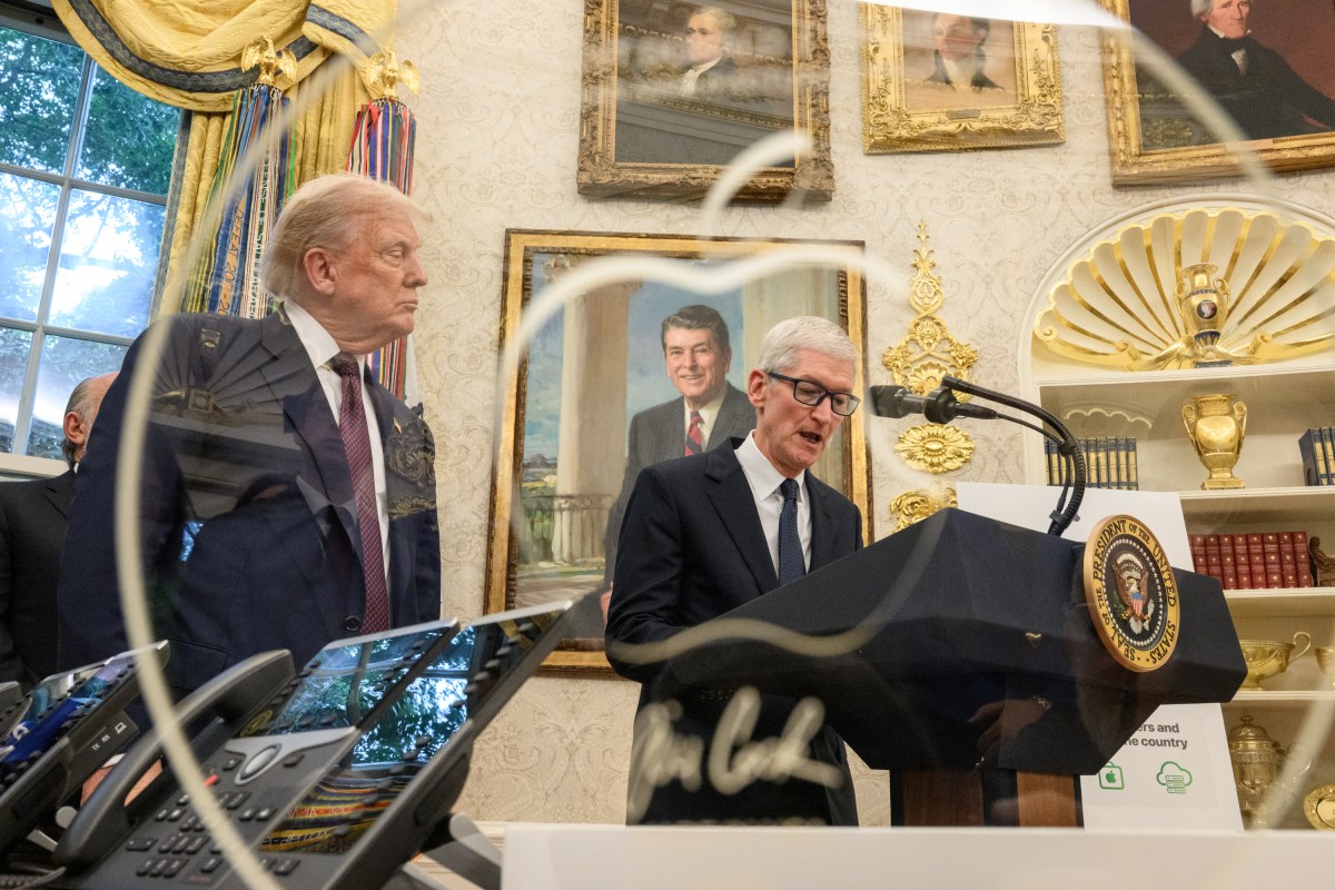 Apple CEO Tim Cook delivers remarks as President Donald Trump looks on, announcing a $100 billion investment in the U.S., Wednesday, August 6, 2025, in the Oval Office. (Official White House Photo by Daniel Torok)