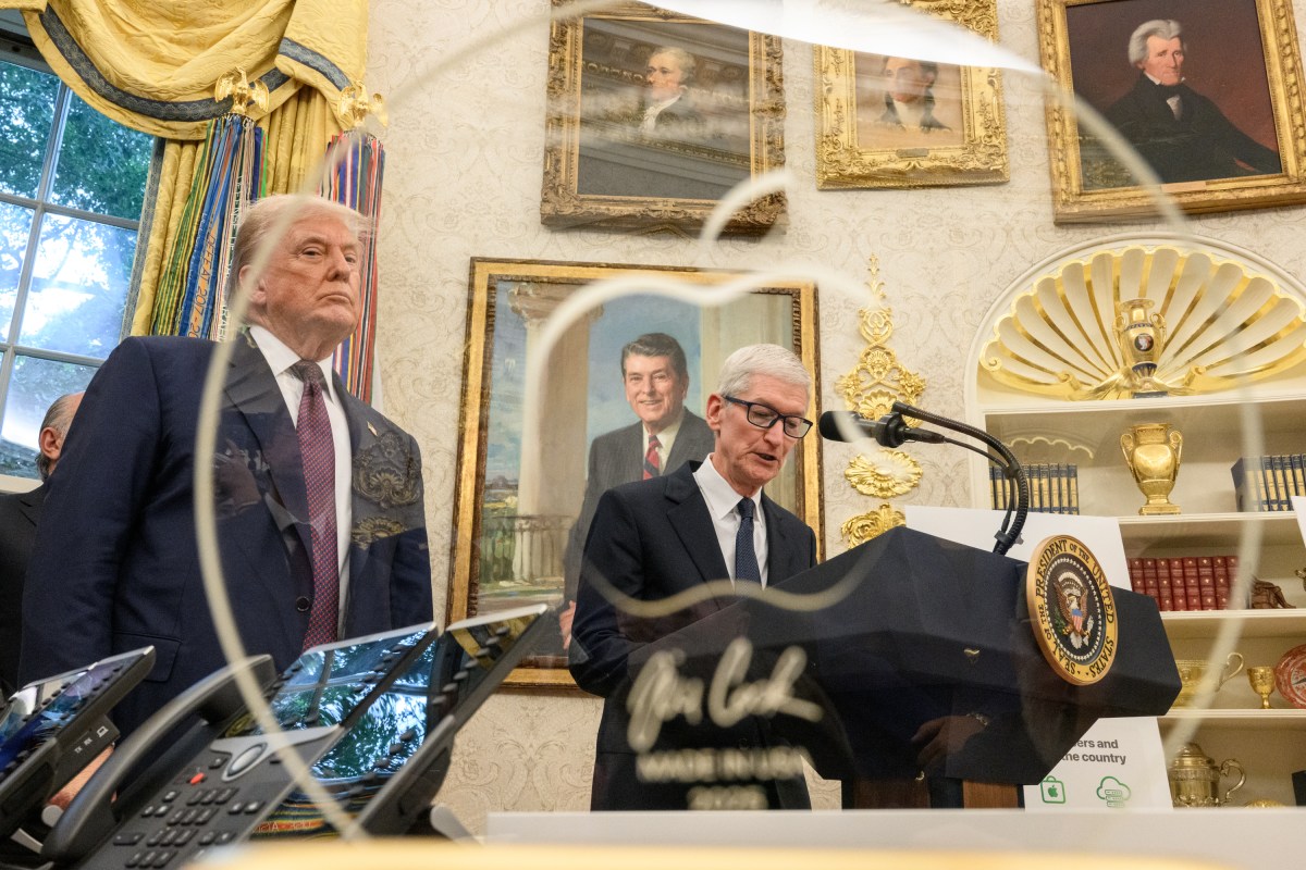 Apple CEO Tim Cook delivers remarks as President Donald Trump looks on, announcing a $100 billion investment in the U.S., Wednesday, August 6, 2025, in the Oval Office. (Official White House Photo by Daniel Torok)