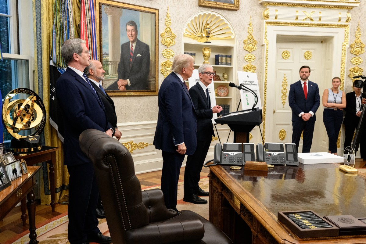 Apple CEO Tim Cook delivers remarks as President Donald Trump looks on, announcing a $100 billion investment in the U.S., Wednesday, August 6, 2025, in the Oval Office. (Official White House Photo by Daniel Torok)