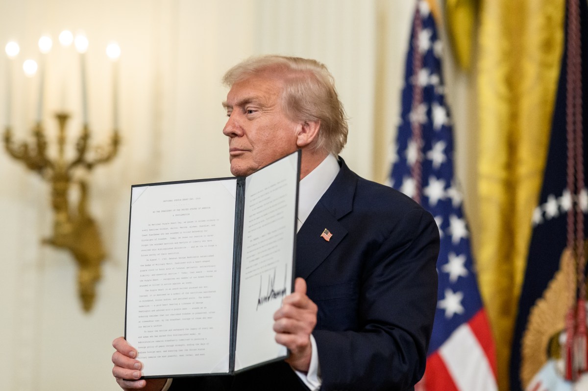 President Donald Trump signs a proclamation affirming National Purple Heart Day in the East Room, Thursday, August 7, 2025. (Official White House Photo by Joyce N. Boghosian)
