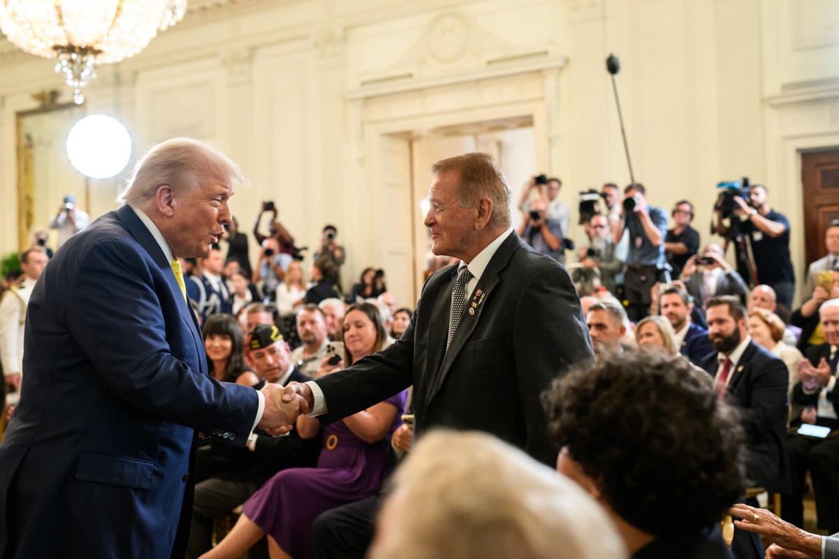 President Donald Trump greets members of the crowd after signing a proclamation recognizing National Purple Heart Day in the East Room, Thursday, August 7, 2025. (Official White House Photo by Joyce N. Boghosian)