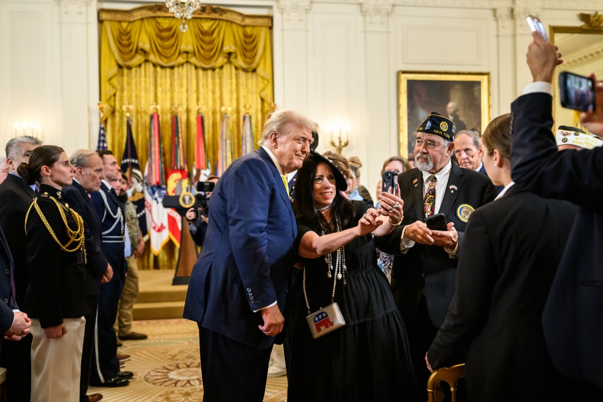 President Donald Trump greets members of the crowd after signing a proclamation recognizing National Purple Heart Day in the East Room, Thursday, August 7, 2025. (Official White House Photo by Joyce N. Boghosian)