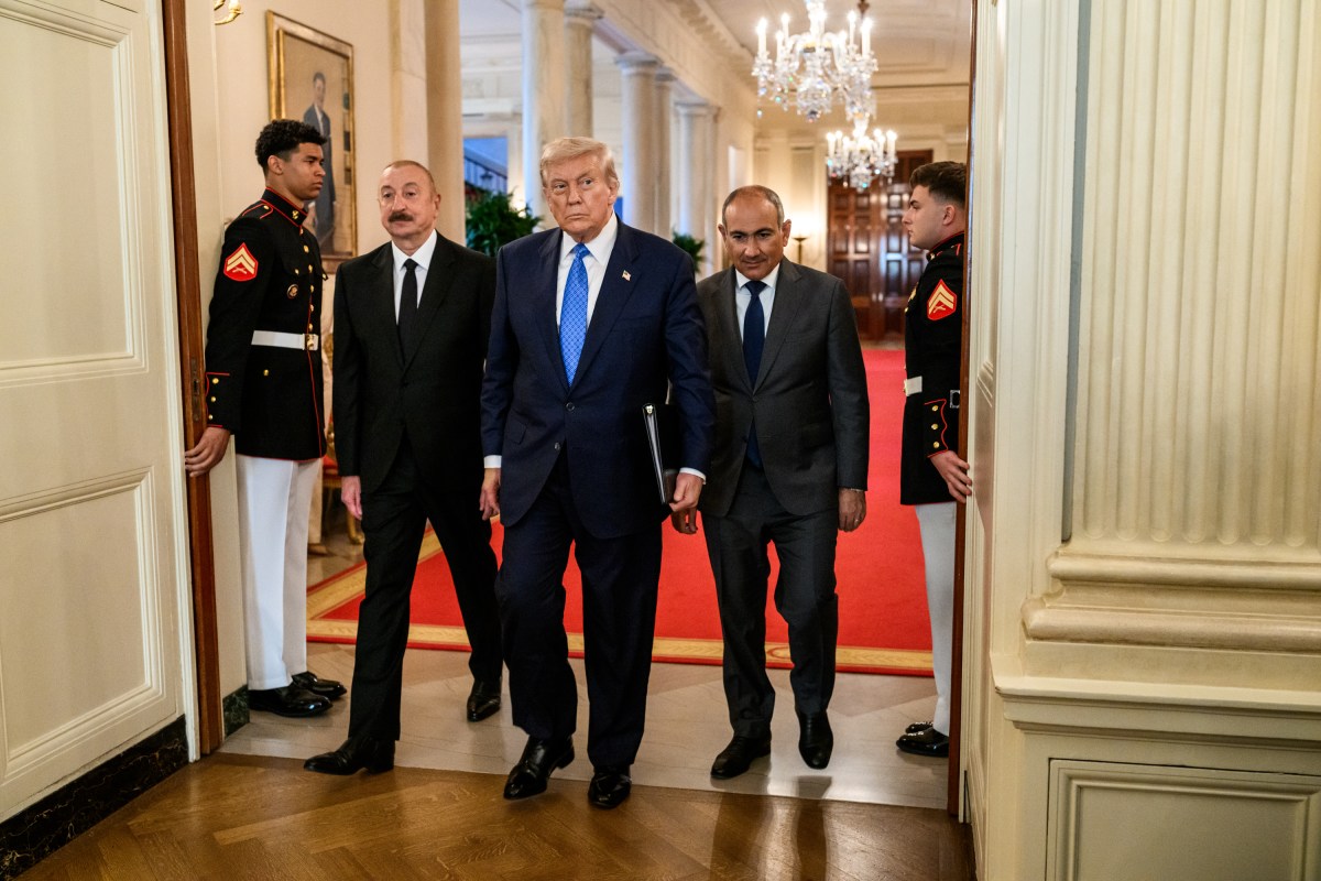 President Donald Trump signs a trilateral joint declaration with President Ilham Aliyev of Azerbaijan and Prime Minister Nikol Pashinyan of Armenia, Friday, August 8, 2025, in the State Dining Room. (Official White House Photo by Daniel Torok)