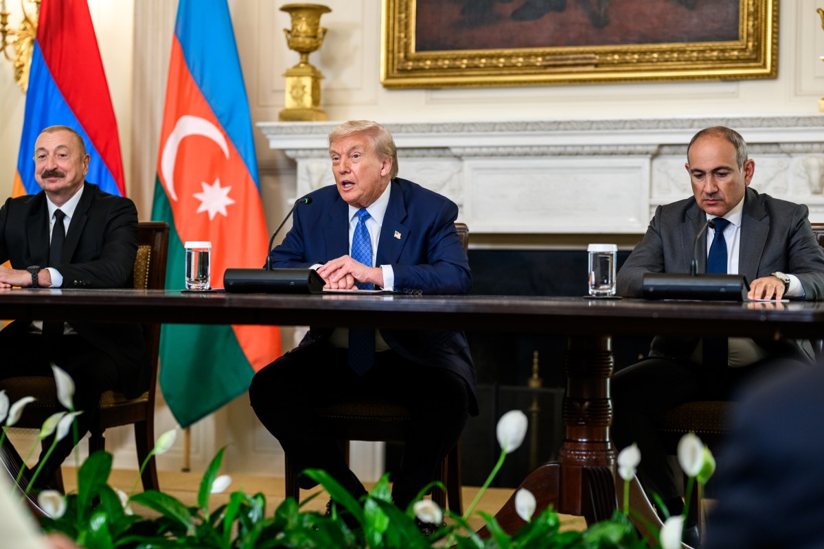 President Donald Trump signs a trilateral joint declaration with President Ilham Aliyev of Azerbaijan and Prime Minister Nikol Pashinyan of Armenia, Friday, August 8, 2025, in the State Dining Room. (Official White House Photo by Daniel Torok)