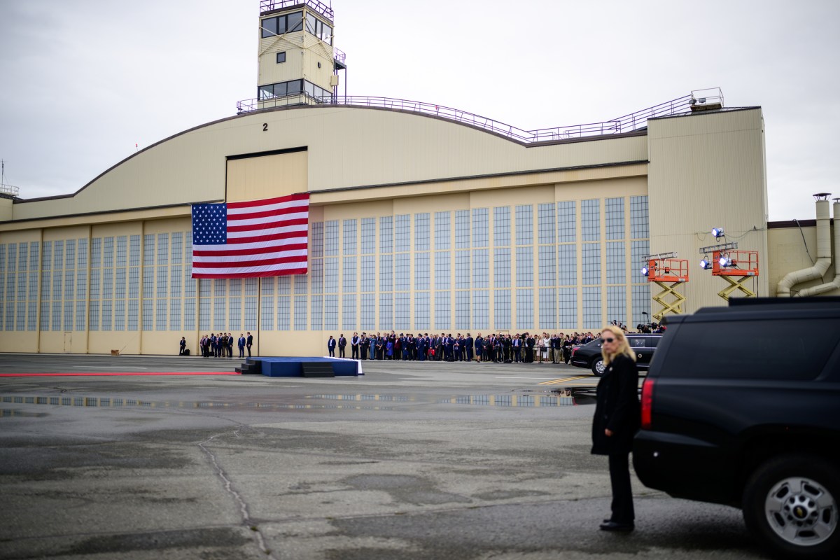 Crowds wait for President Donald Trump to greet Russian president Vladimir Putin at Joint Base Elmendorf Richardson in Anchorage, Alaska, Friday, August 15, 2025. (Official White House Photo by Daniel Torok)
