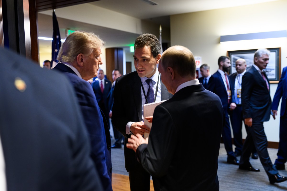 President Donald Trump and Russian president Vladimir Putin speak backstage after they held a joint press conference after their meeting at the Arctic Warrior Event Center at Joint Base Elmendorf Richardson in Anchorage, Alaska, Friday, August 15, 2025. (Official White House Photo by Daniel Torok)