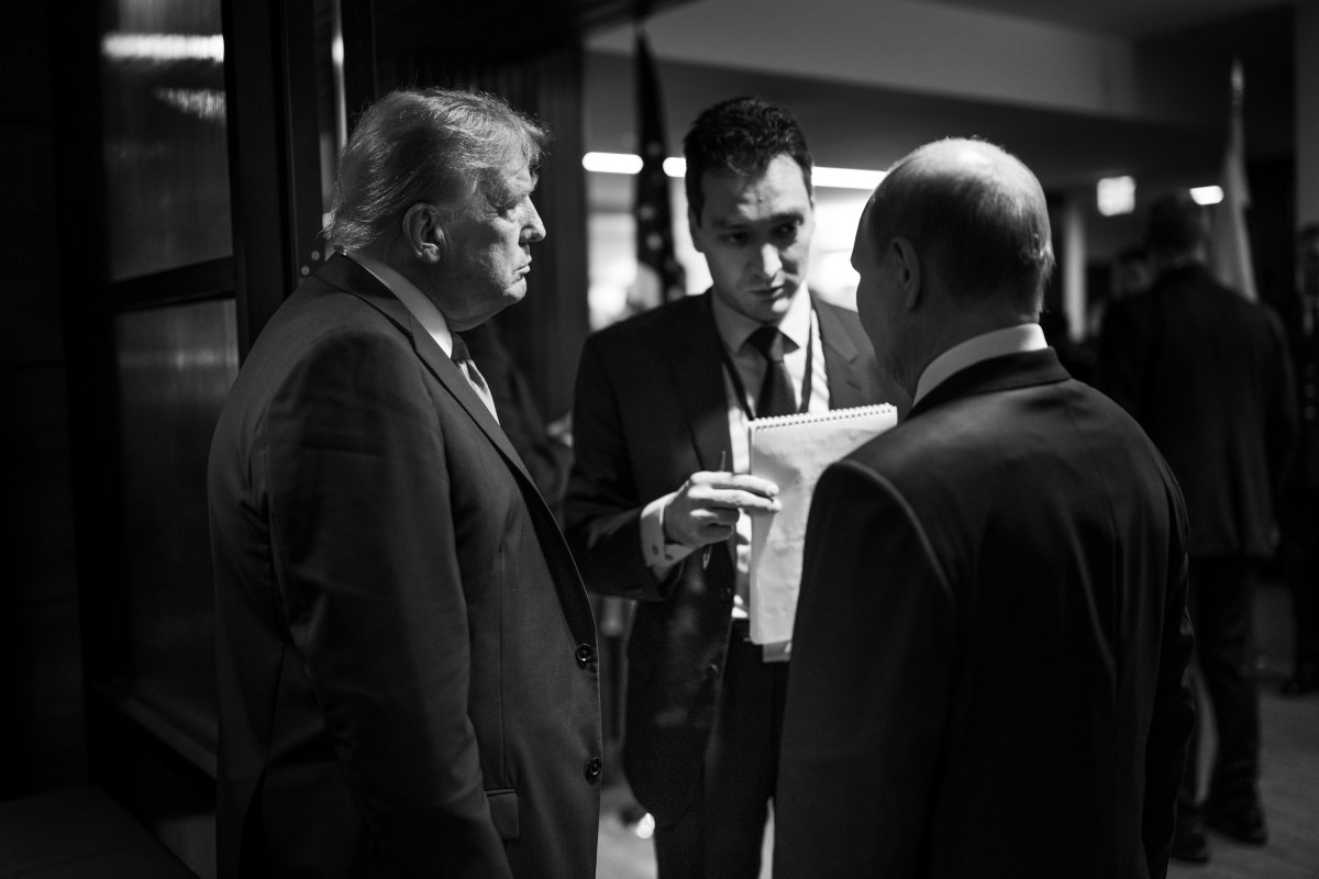 President Donald Trump and Russian president Vladimir Putin speak backstage after they held a joint press conference after their meeting at the Arctic Warrior Event Center at Joint Base Elmendorf Richardson in Anchorage, Alaska, Friday, August 15, 2025. (Official White House Photo by Daniel Torok)