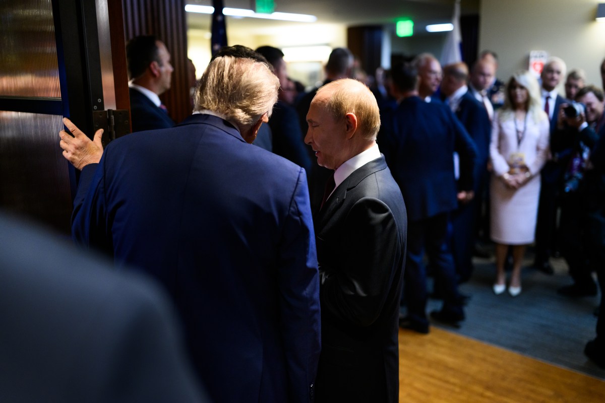 President Donald Trump and Russian president Vladimir Putin speak backstage after they held a joint press conference after their meeting at the Arctic Warrior Event Center at Joint Base Elmendorf Richardson in Anchorage, Alaska, Friday, August 15, 2025. (Official White House Photo by Daniel Torok)