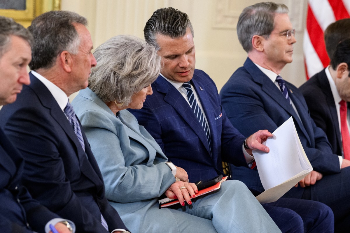 Chief of Staff Susie Wiles speaks with Secretary of Defense Pete Hegseth as President Donald Trump hosts a multilateral meeting with President Volodymyr Zelenskyy of Ukraine and European leaders, Monday, August 18, 2025, in the East Room of the White House. (Official White House Photo by Daniel Torok)