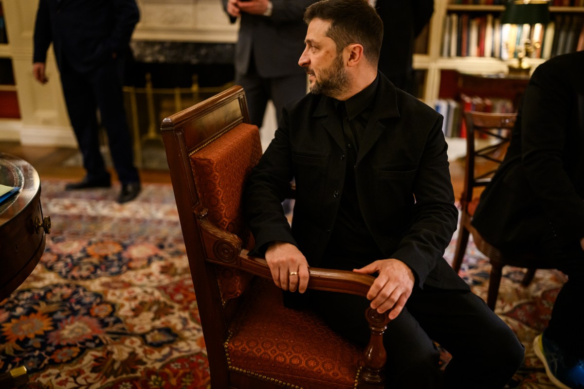 Ukrainian President Volodymyr Zelenskyy speaks with European leaders and staff as they wait in the White House Library as President Donald Trump makes a call with Russian President Vladimir Putin in the Oval Office, Monday, August 18, 2025. (Official White House Photo by Daniel Torok)