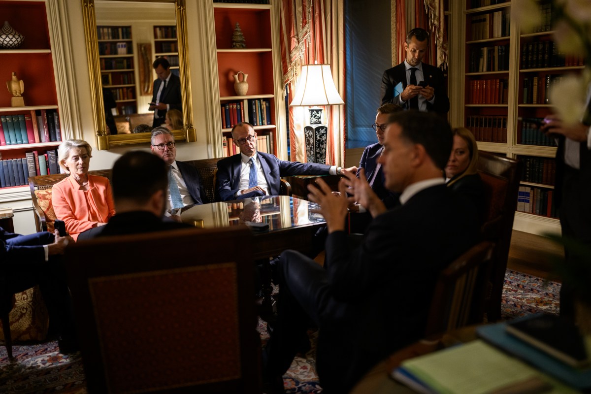 European Commission President Ursula von der Leyen, U.K. Prime Minister Keir Starmer, German Chancellor Friedrich Merz, President Alexander Stubb of Finland, Italian Prime Minister Giorgia Meloni, Secretary General Mark Rutte of NATO, and Ukrainian President Volodymyr Zelenskyy wait in the White House Library as President Donald Trump makes a call with Russian President Vladimir Putin in the Oval Office, Monday, August 18, 2025. (Official White House Photo by Daniel Torok)