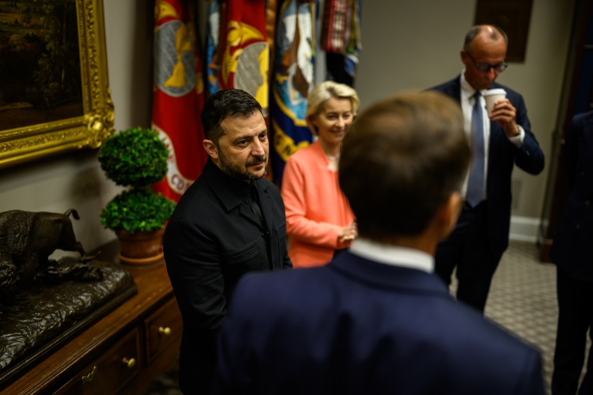 Ukrainian President Volodymyr Zelenskyy, European Commission President Ursula von der Leyen, and German Chancellor Friedrich Merz wait in the Roosevelt Room as President Donald Trump makes a call with Russian President Vladimir Putin in the Oval Office, Monday, August 18, 2025. (Official White House Photo by Daniel Torok)