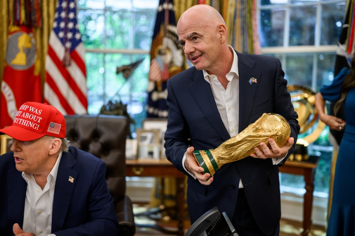President Donald Trump, flanked by Vice President JD Vance and FIFA President Gianni Infantino, announces that the FIFA World Cup 2025 draw will take place on December 5 at the Kennedy Center, Friday, August 22, 2025 (Official White House Photo by Daniel Torok)