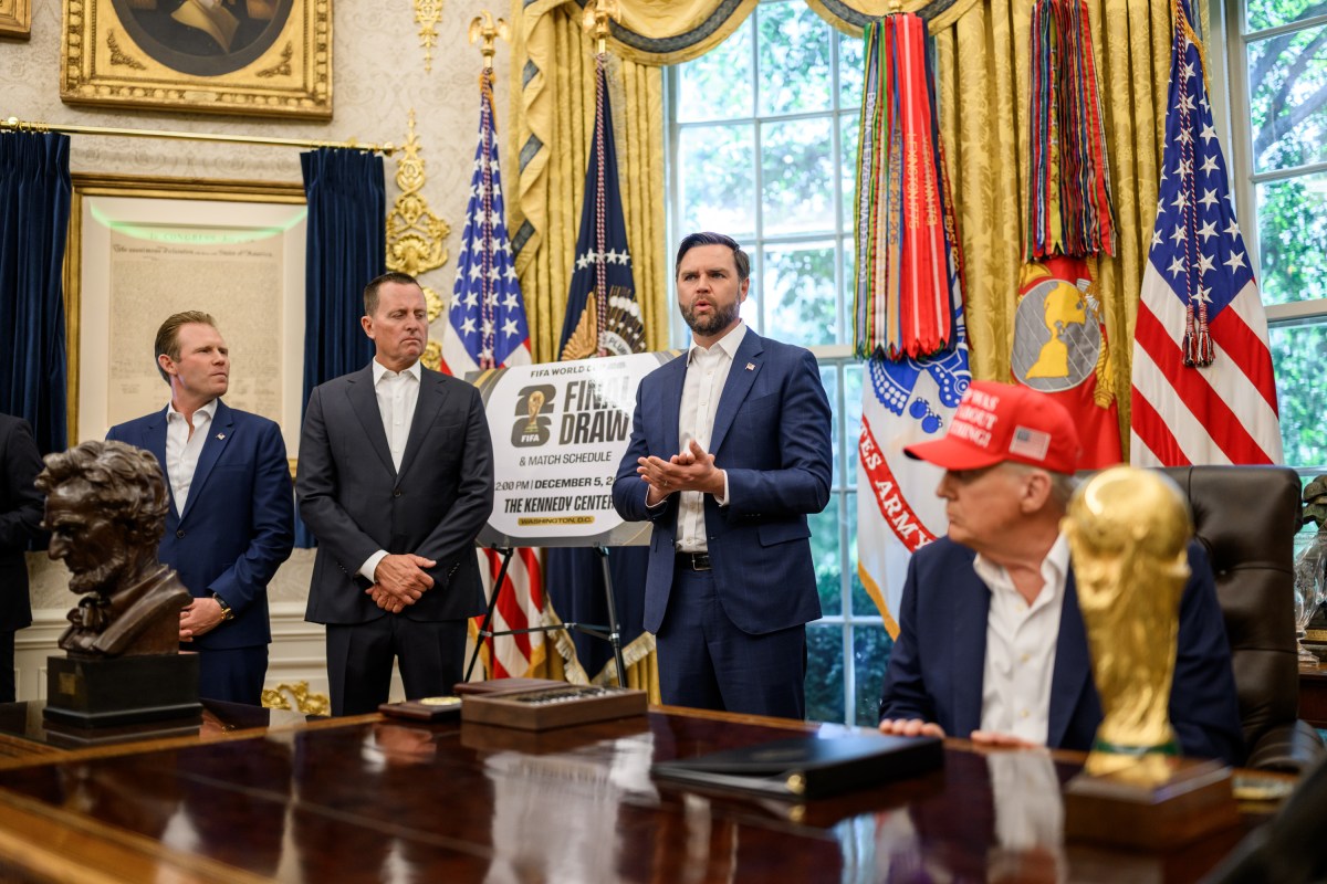 President Donald Trump, flanked by Vice President JD Vance and FIFA President Gianni Infantino, announces that the FIFA World Cup 2025 draw will take place on December 5 at the Kennedy Center, Friday, August 22, 2025 (Official White House Photo by Daniel Torok)