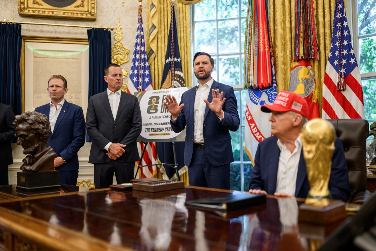 President Donald Trump, flanked by Vice President JD Vance and FIFA President Gianni Infantino, announces that the FIFA World Cup 2025 draw will take place on December 5 at the Kennedy Center, Friday, August 22, 2025 (Official White House Photo by Daniel Torok)