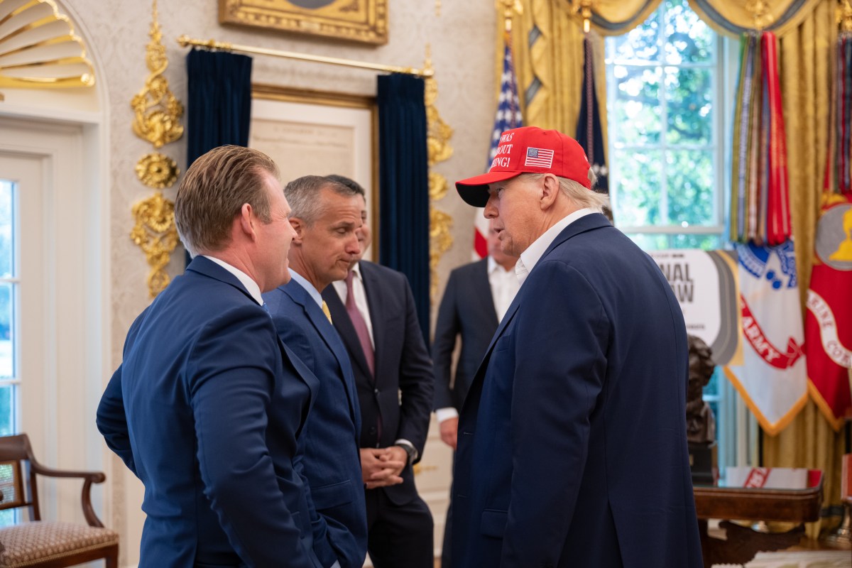 President Donald Trump, flanked by Vice President JD Vance and FIFA President Gianni Infantino, announces that the FIFA World Cup draw will take place on December 5 at the Kennedy Center, Friday, August 22, 2025. (Official White House Photo by Joyce N. Boghosian)