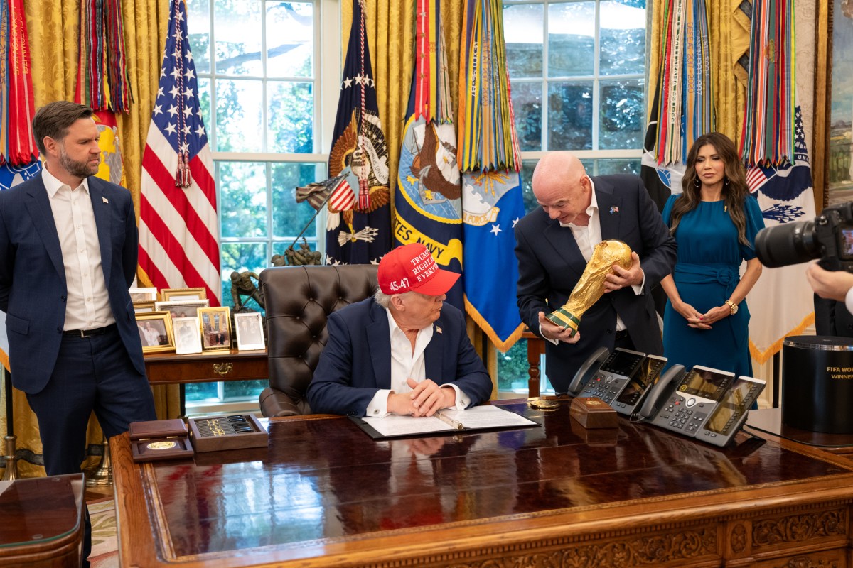 President Donald Trump, flanked by Vice President JD Vance and FIFA President Gianni Infantino, announces that the FIFA World Cup draw will take place on December 5 at the Kennedy Center, Friday, August 22, 2025. (Official White House Photo by Joyce N. Boghosian)