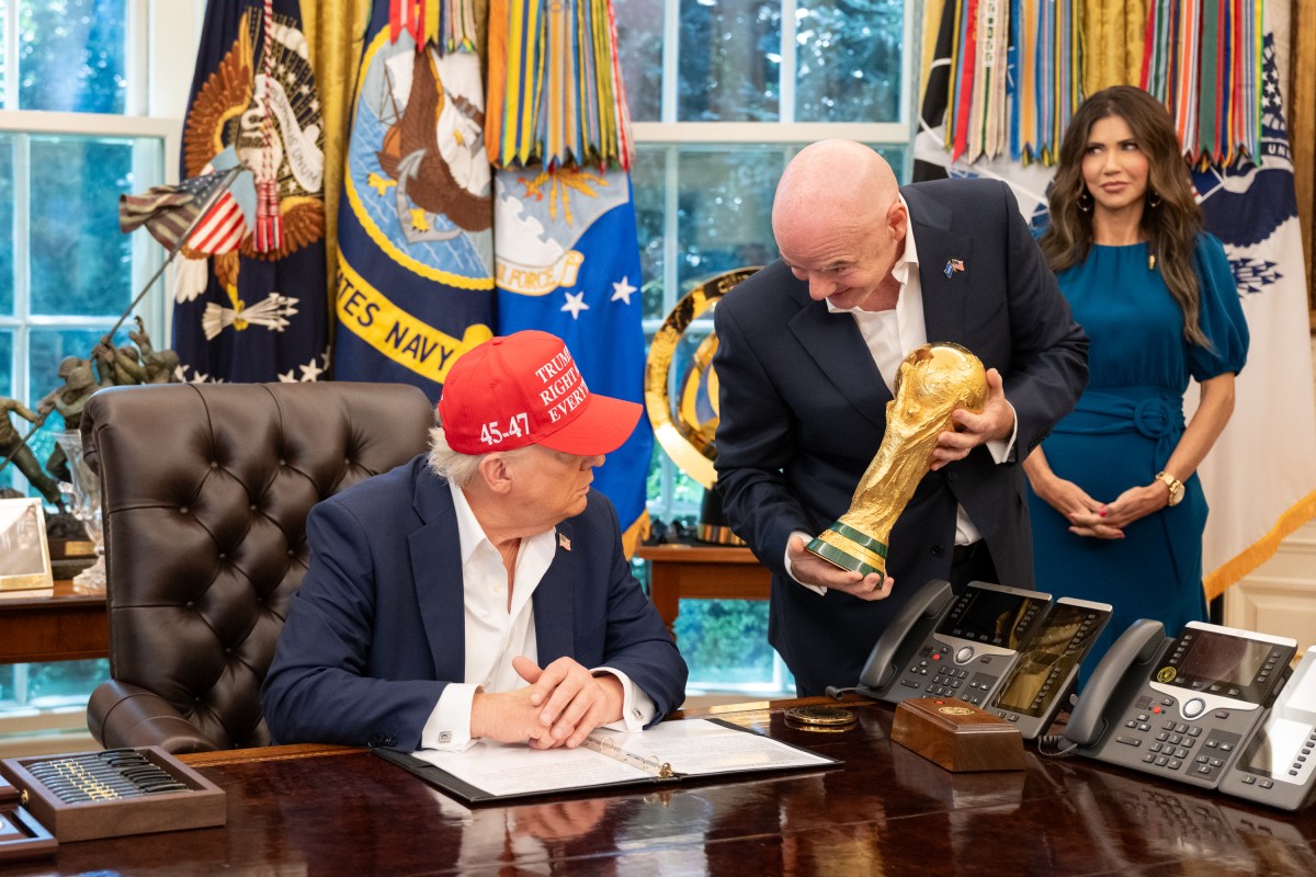 President Donald Trump, flanked by Vice President JD Vance and FIFA President Gianni Infantino, announces that the FIFA World Cup draw will take place on December 5 at the Kennedy Center, Friday, August 22, 2025. (Official White House Photo by Joyce N. Boghosian)