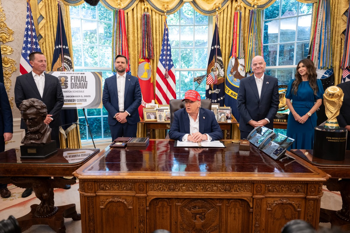 President Donald Trump, flanked by Vice President JD Vance and FIFA President Gianni Infantino, announces that the FIFA World Cup draw will take place on December 5 at the Kennedy Center, Friday, August 22, 2025. (Official White House Photo by Joyce N. Boghosian)