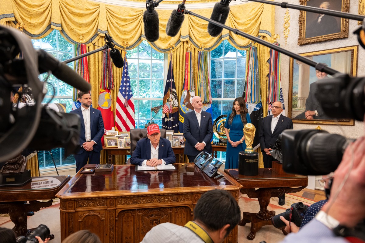 President Donald Trump, flanked by Vice President JD Vance and FIFA President Gianni Infantino, announces that the FIFA World Cup draw will take place on December 5 at the Kennedy Center, Friday, August 22, 2025. (Official White House Photo by Joyce N. Boghosian)