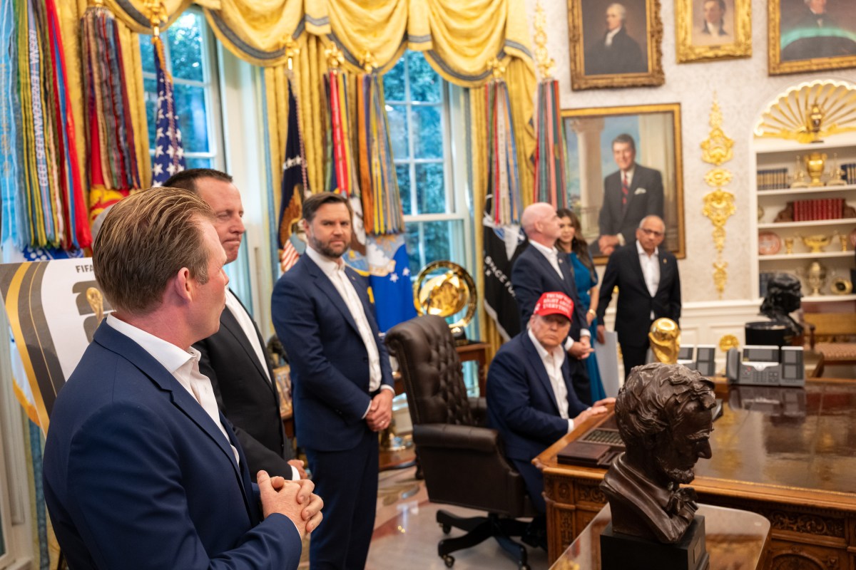 President Donald Trump, flanked by Vice President JD Vance and FIFA President Gianni Infantino, announces that the FIFA World Cup draw will take place on December 5 at the Kennedy Center, Friday, August 22, 2025. (Official White House Photo by Joyce N. Boghosian)