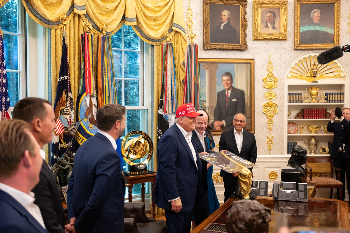 President Donald Trump, flanked by Vice President JD Vance and FIFA President Gianni Infantino, announces that the FIFA World Cup draw will take place on December 5 at the Kennedy Center, Friday, August 22, 2025. (Official White House Photo by Joyce N. Boghosian)