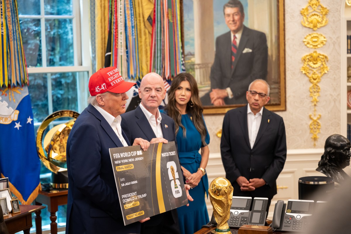 President Donald Trump, flanked by Vice President JD Vance and FIFA President Gianni Infantino, announces that the FIFA World Cup draw will take place on December 5 at the Kennedy Center, Friday, August 22, 2025. (Official White House Photo by Joyce N. Boghosian)