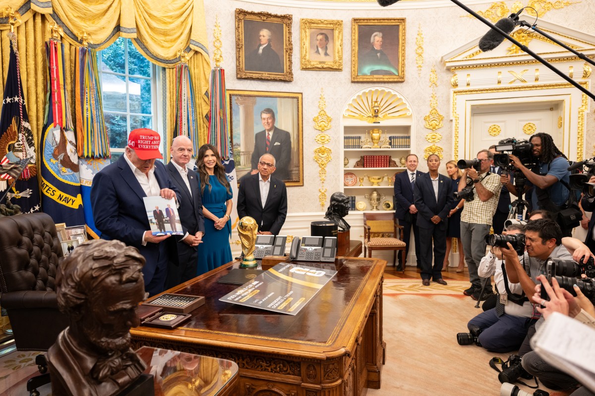 President Donald Trump, flanked by Vice President JD Vance and FIFA President Gianni Infantino, announces that the FIFA World Cup draw will take place on December 5 at the Kennedy Center, Friday, August 22, 2025. (Official White House Photo by Joyce N. Boghosian)