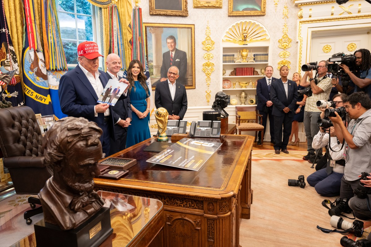 President Donald Trump, flanked by Vice President JD Vance and FIFA President Gianni Infantino, announces that the FIFA World Cup draw will take place on December 5 at the Kennedy Center, Friday, August 22, 2025. (Official White House Photo by Joyce N. Boghosian)