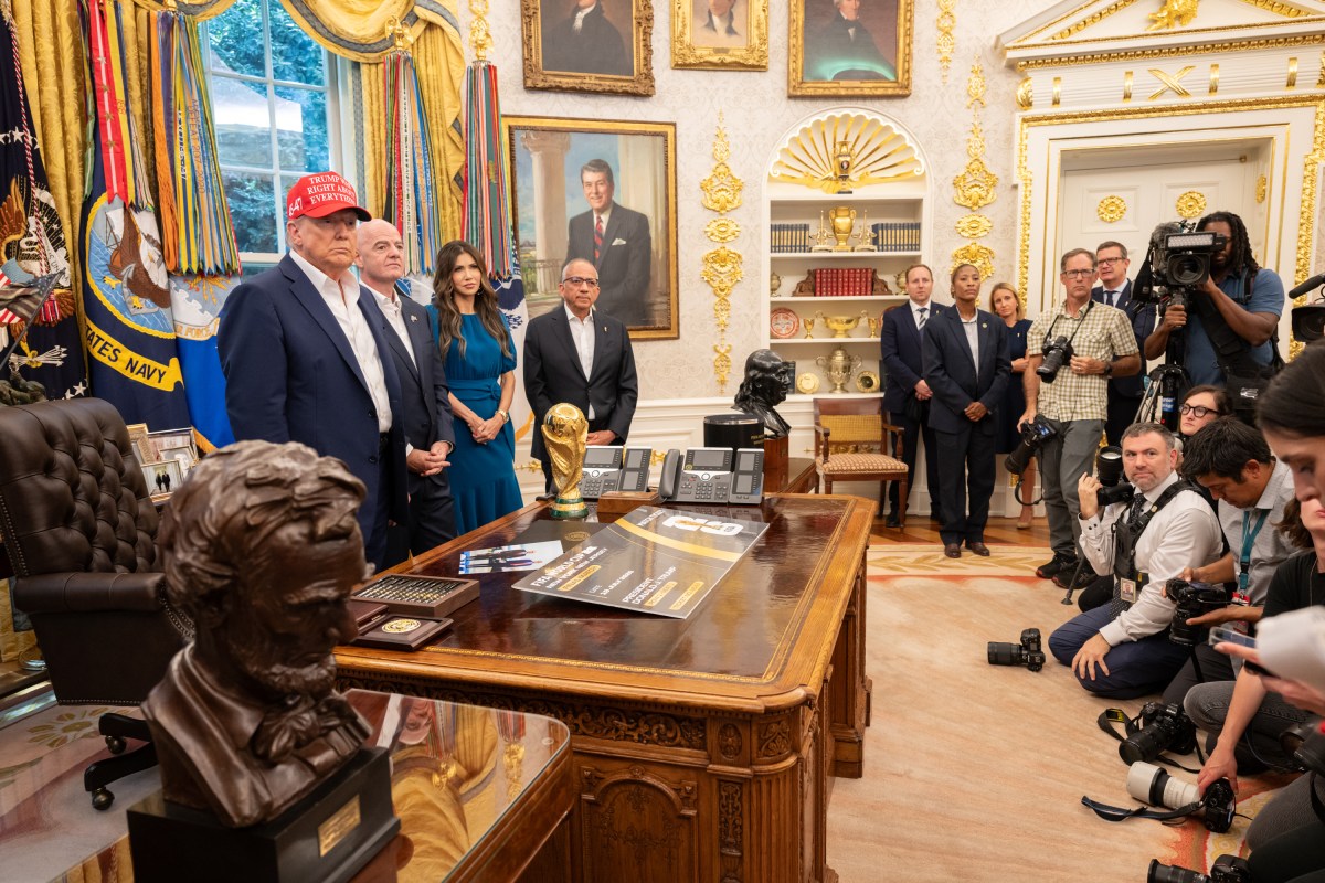 President Donald Trump, flanked by Vice President JD Vance and FIFA President Gianni Infantino, announces that the FIFA World Cup draw will take place on December 5 at the Kennedy Center, Friday, August 22, 2025. (Official White House Photo by Joyce N. Boghosian)