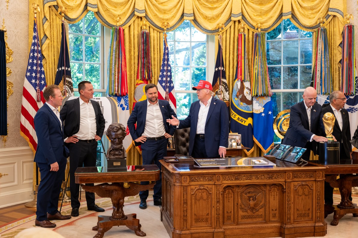 President Donald Trump, flanked by Vice President JD Vance and FIFA President Gianni Infantino, announces that the FIFA World Cup draw will take place on December 5 at the Kennedy Center, Friday, August 22, 2025. (Official White House Photo by Joyce N. Boghosian)
