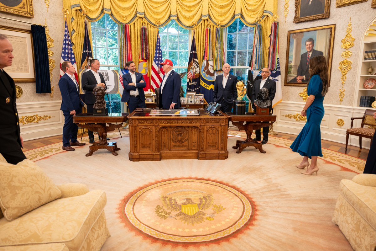 President Donald Trump, flanked by Vice President JD Vance and FIFA President Gianni Infantino, announces that the FIFA World Cup draw will take place on December 5 at the Kennedy Center, Friday, August 22, 2025. (Official White House Photo by Joyce N. Boghosian)