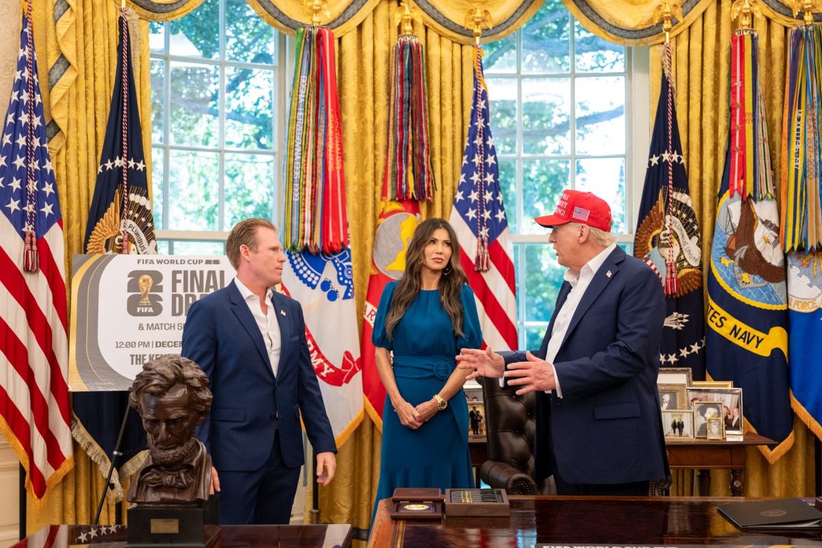 President Donald Trump, flanked by Vice President JD Vance and FIFA President Gianni Infantino, announces that the FIFA World Cup draw will take place on December 5 at the Kennedy Center, Friday, August 22, 2025. (Official White House Photo by Joyce N. Boghosian)