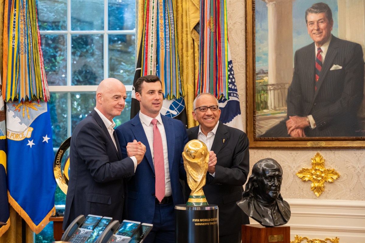 President Donald Trump, flanked by Vice President JD Vance and FIFA President Gianni Infantino, announces that the FIFA World Cup draw will take place on December 5 at the Kennedy Center, Friday, August 22, 2025. (Official White House Photo by Joyce N. Boghosian)
