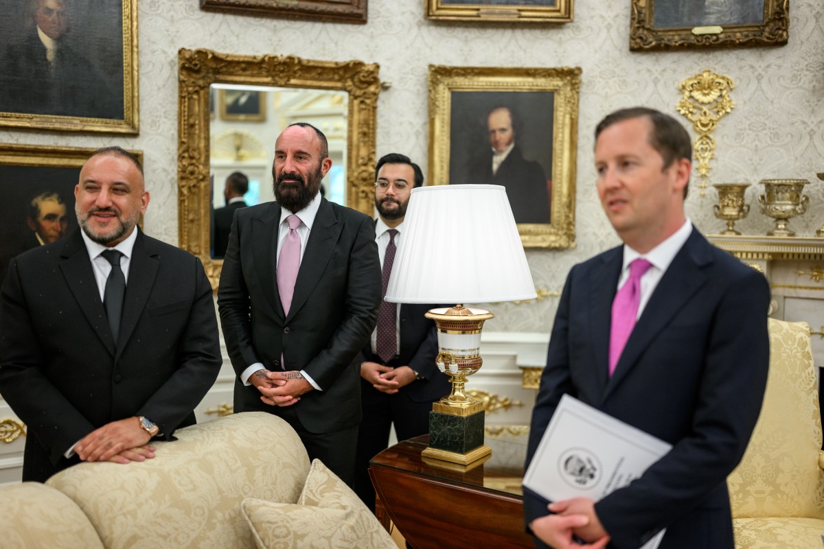 President Donald Trump participates in the swearing-in ceremony for U.S. Ambassador to Portugal John Arrigo, Tuesday, September 9, 2025, in the Oval Office. (Official White House Photo by Daniel Torok)