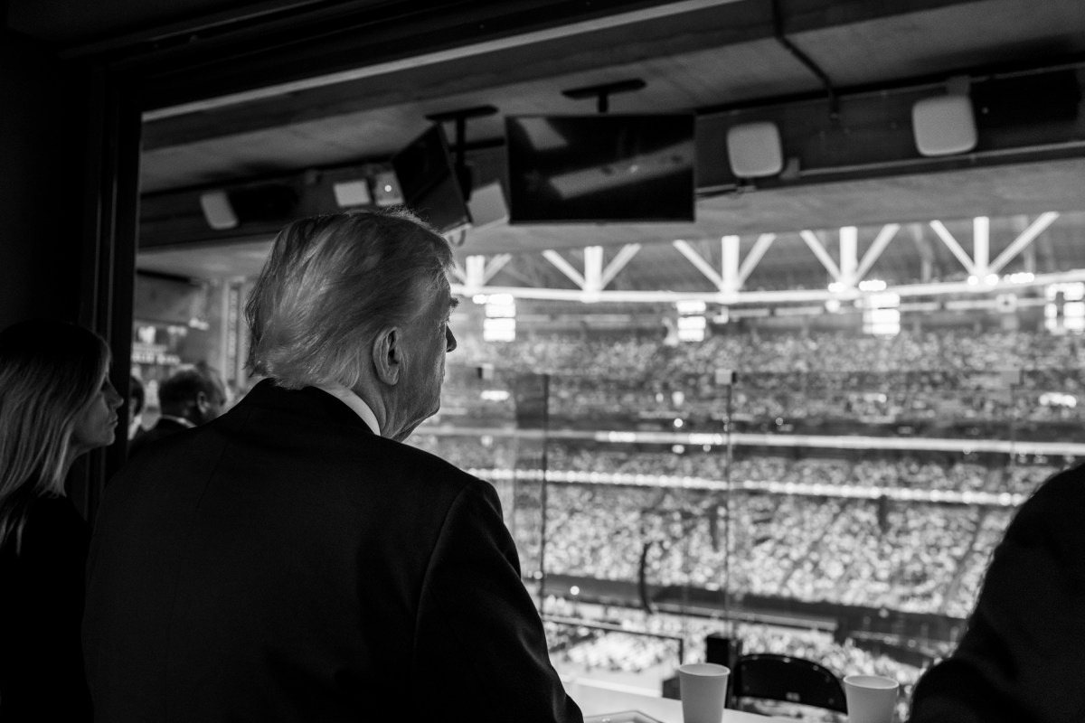 President Donald Trump watches speakers during the Memorial Service for Charlie Kirk at State Farm Stadium in Glendale, Arizona, Sunday, September 21, 2025.(Official White House Photo by Daniel Torok)