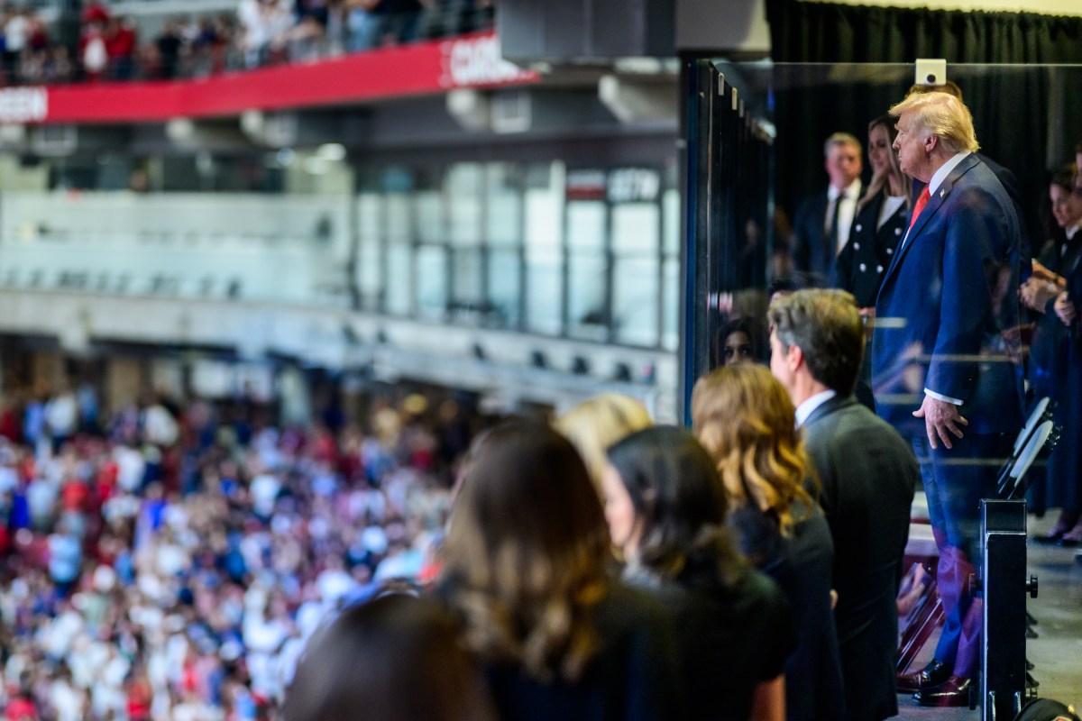 President Donald Trump watches speakers during the Memorial Service for Charlie Kirk at State Farm Stadium in Glendale, Arizona, Sunday, September 21, 2025.(Official White House Photo by Daniel Torok)