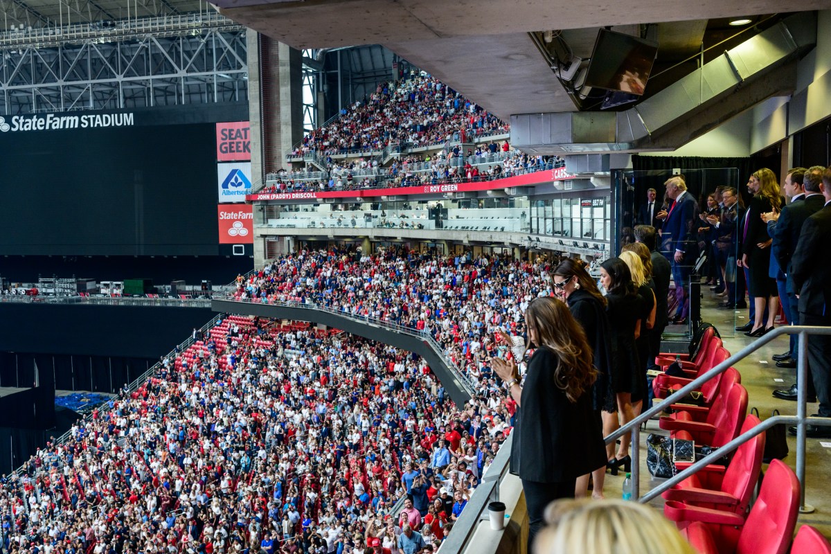 President Donald Trump watches speakers during the Memorial Service for Charlie Kirk at State Farm Stadium in Glendale, Arizona, Sunday, September 21, 2025.(Official White House Photo by Daniel Torok)