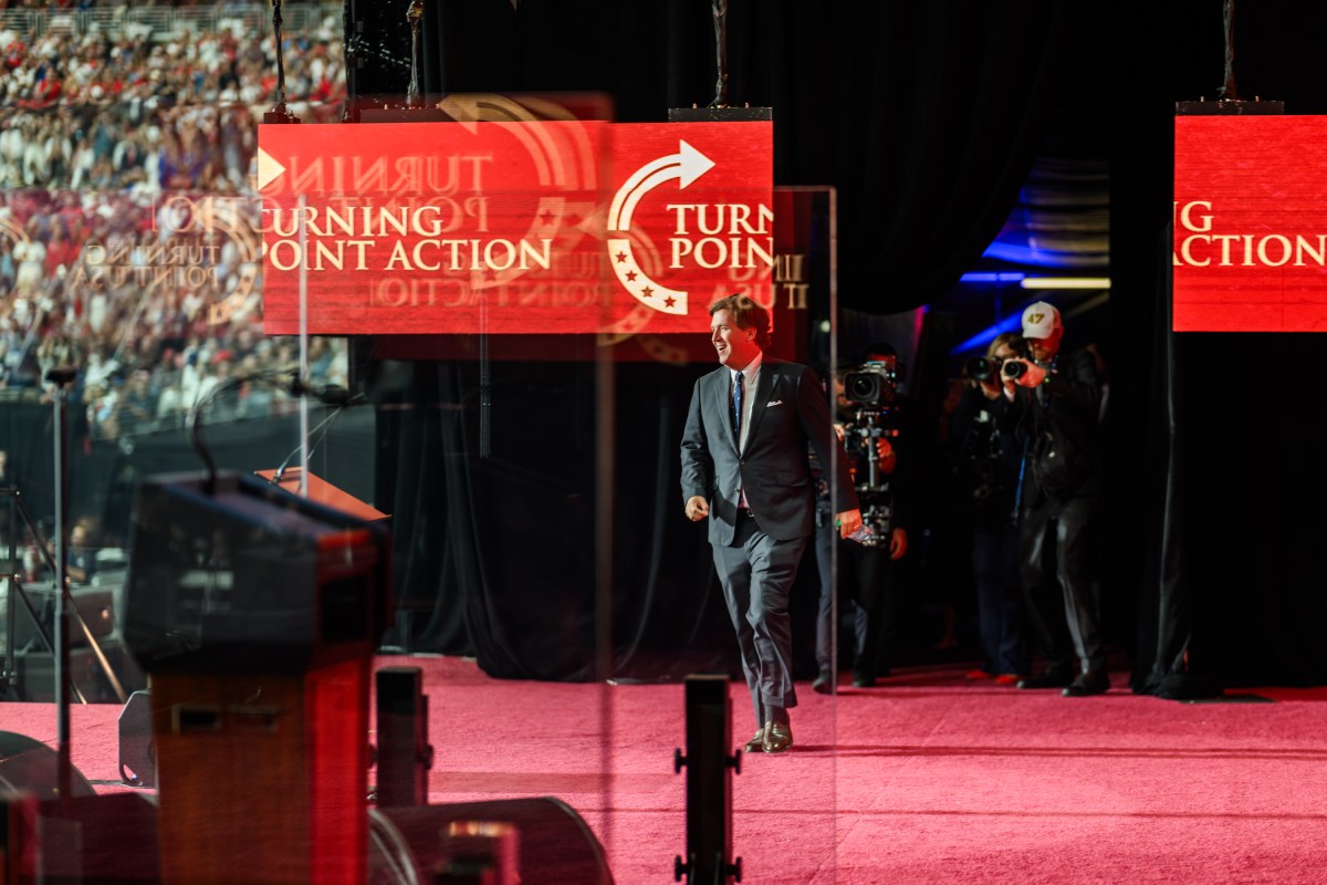 Tucker Carlson delivers remarks during the Memorial Service for Charlie Kirk at State Farm Stadium in Glendale, Arizona, Sunday, September 21, 2025.(Official White House Photo by Daniel Torok)