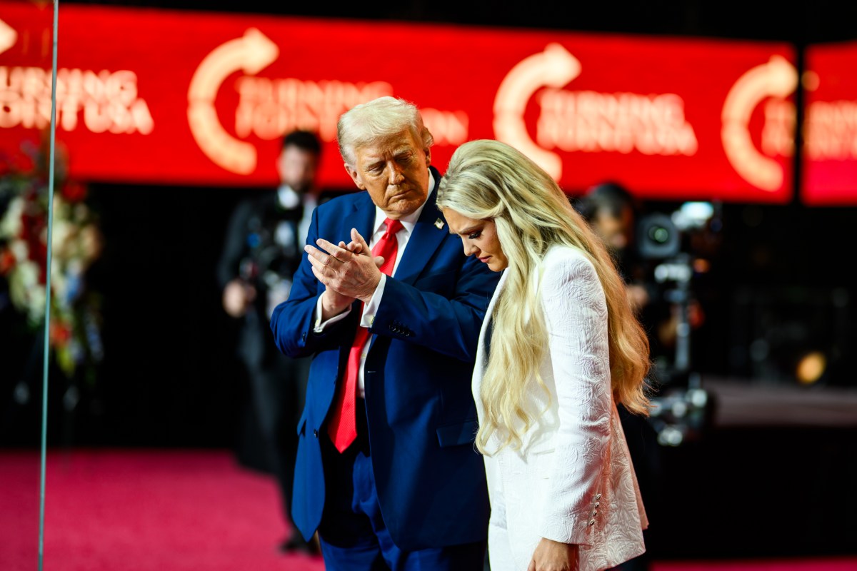 President Donald Trump takes the stage with Erika Kirk at the Memorial Service for Charlie Kirk at State Farm Stadium in Glendale, Arizona, Sunday, September 21, 2025. (Official White House Photo by Daniel Torok)