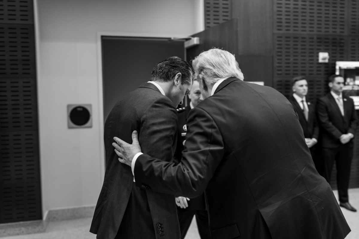 President Donald Trump greets Defense Secretary Pete Hegseth and Chairman of the Joint Chiefs of Staff Dan Caine at Warner Hall, Marine Corps University at Quantico, Virginia on Tuesday, September 30, 2025, as he arrives for a meeting with top military leadership. (Official White House Photo by Daniel Torok)