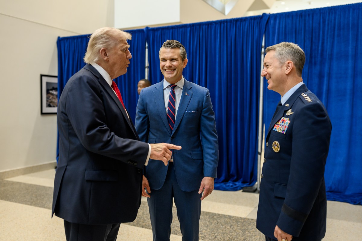 President Donald Trump greets Defense Secretary Pete Hegseth and Chairman of the Joint Chiefs of Staff Dan Caine at Warner Hall, Marine Corps University at Quantico, Virginia on Tuesday, September 30, 2025, as he arrives for a meeting with top military leadership. (Official White House Photo by Daniel Torok)
