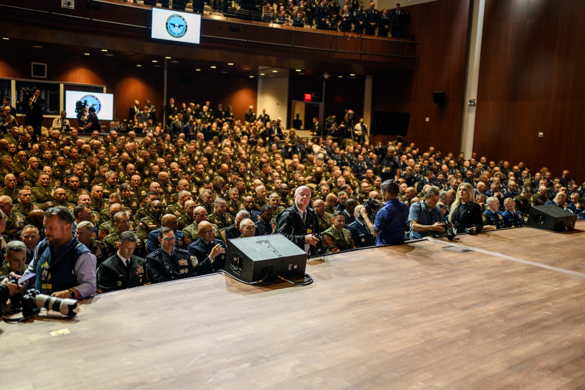 President Donald Trump waits backstage before delivering remarks at a gathering of top military leadership, Tuesday, September 30, 2025, at Marine Corps University in Quantico, Virginia. (Official White House Photo by Daniel Torok)