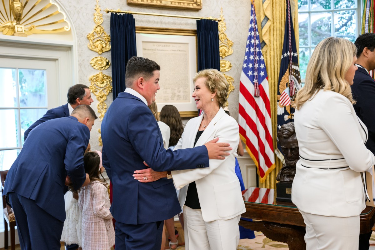 President Donald Trump, joined by HHS Secretary Robert F. Kennedy, Jr. and children affected by cancer and their families, signs an Executive Order to accelerate pediatric cancer research, Tuesday, September 30, 2025, in the Oval Office. (Official White House Photo by Molly Riley)