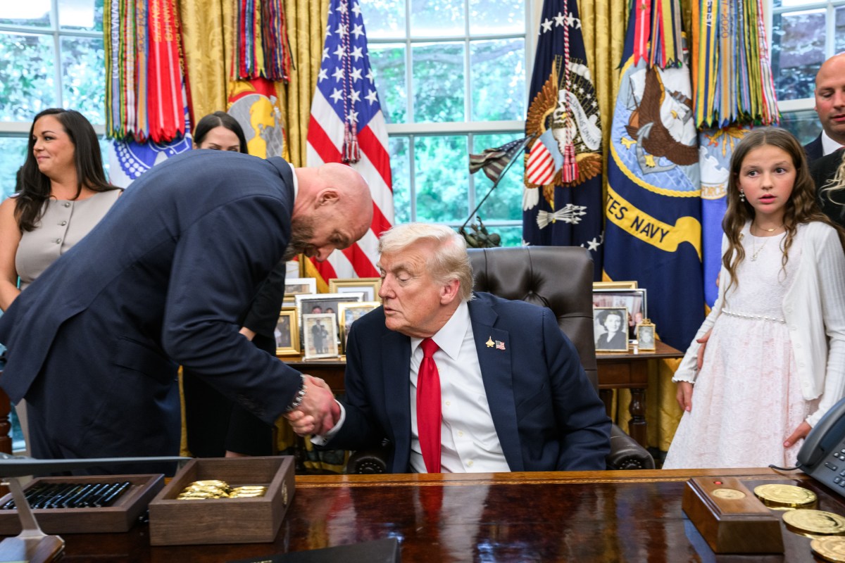 President Donald Trump, joined by HHS Secretary Robert F. Kennedy, Jr. and children affected by cancer and their families, signs an Executive Order to accelerate pediatric cancer research, Tuesday, September 30, 2025, in the Oval Office. (Official White House Photo by Molly Riley)